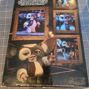 NECA Gremlins, Gizmo, Christmas Figure with interchangeable faces.